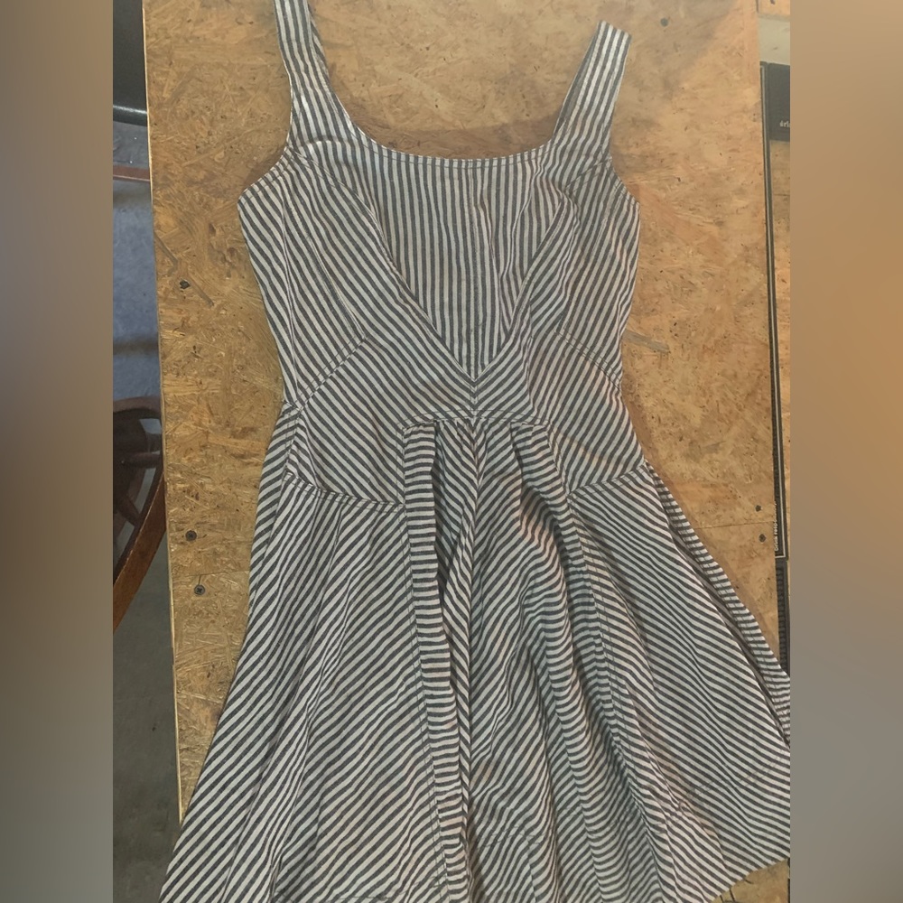 Fitted black and white striped dress.